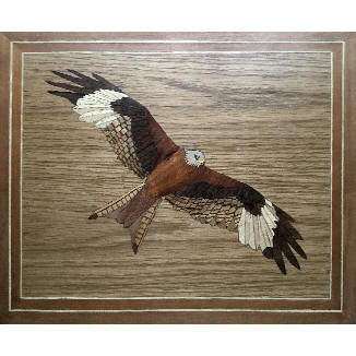 marquetry picture of bird in flight