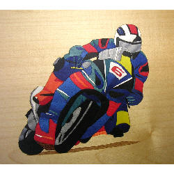 marquetry picture of a man on a racing motorcycle