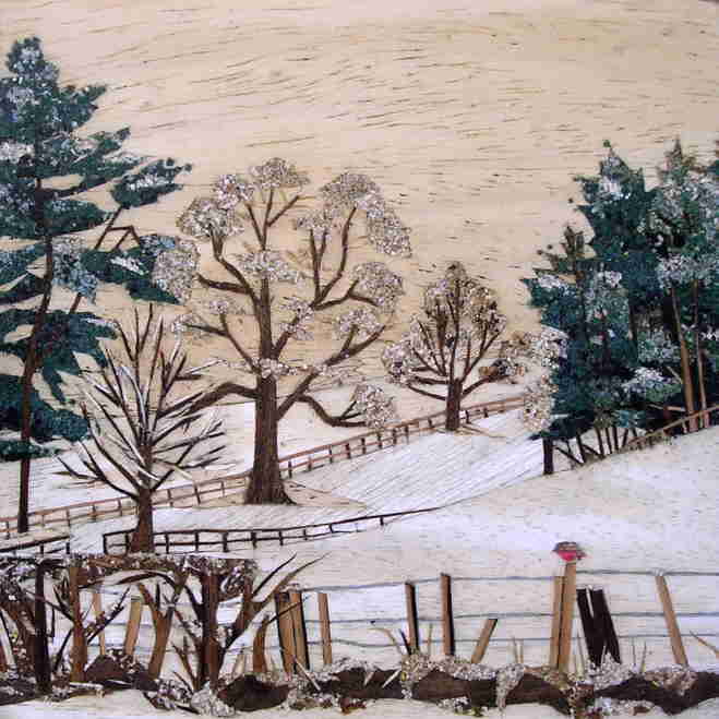 marquetry picture of a snowy landscape